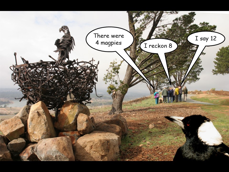 A dog looking at a statue

Description automatically generated with low confidence
